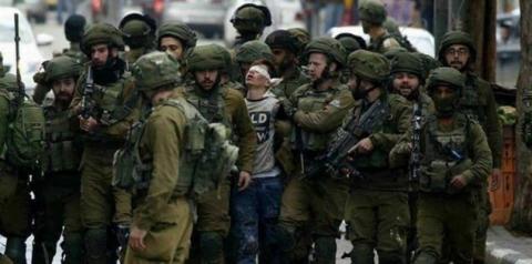 Fawzi al-Juneidi, 16, detained by Israeli Defense Forces in Hebron. 7 December 2017.