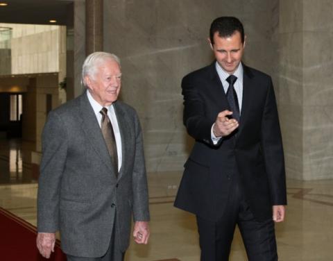  syrias-president-bashar-al-assad-welcomes-former-u-s-president-jimmy-carter-before-meeting.jpg?itok=9kgOgVs1